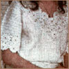 Белая блузка и юбка, украшенные цветочными мотивами - www.klubochek.org